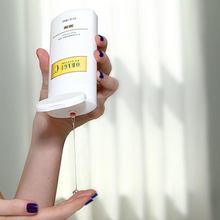 Load image into Gallery viewer, Woman pouring Obagi-C C-Cleansing Gel by hoodermatology.com