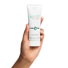 Load image into Gallery viewer, SUZANOBAGIMD Physicial Defense Tinted Sunscreen SPF50 held byhand hoodermatology.com