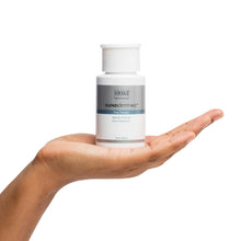 Load image into Gallery viewer, A person holding Obagi Clenziderm MD Pore Therapy by hoodermatology.com